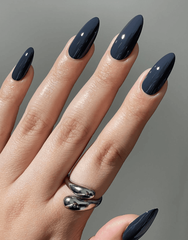 Glossy Deep Navy Stiletto Nails Glossy Deep Navy Stiletto Nails — Winter Nail Colors for Women Over 50