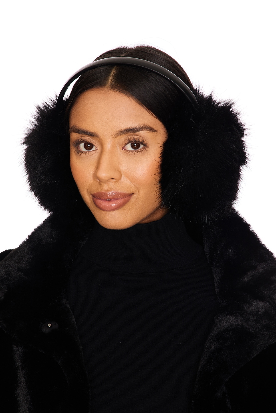Sophisticated Black: Faux Fur Earmuffs with Monochromatic Outfit Sophisticated Black: Faux Fur Earmuffs with Monochromatic Outfit — Earmuffs Outfits