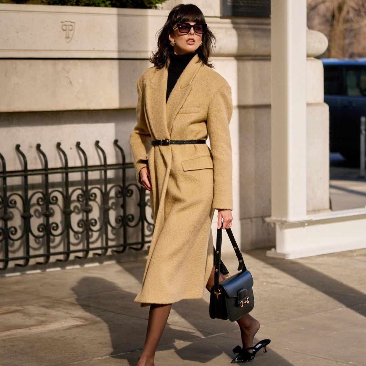 Long Camel Coat Cinched with Black Belt Over Black Turtleneck Long Camel Coat Cinched with Black Belt Over Black Turtleneck — Winter Work Outfits