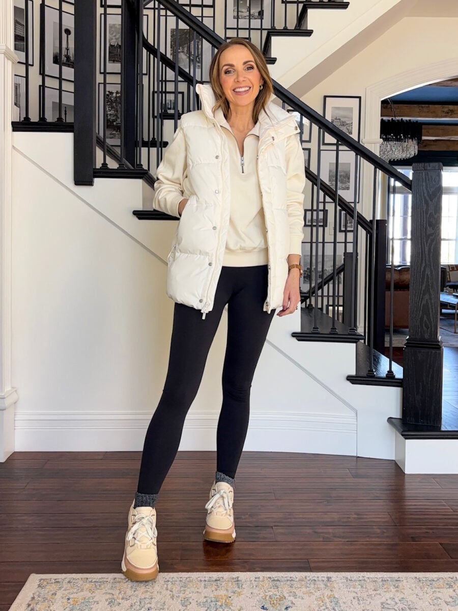 White Puffer Vest Over Quarter-Zip for Layered Warmth — Winter Workout Outfits