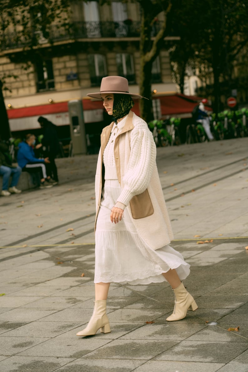 Cream Textured Coat Over White Tiered Skirt and Knit Sweater — Winter White Outfits