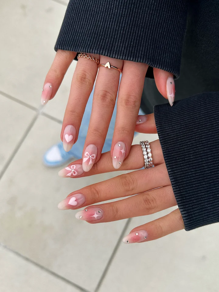 Pale Pink with Hearts, Bows, and Rhinestones Pale Pink with Hearts, Bows, and Rhinestones — Pastel Winter Nails