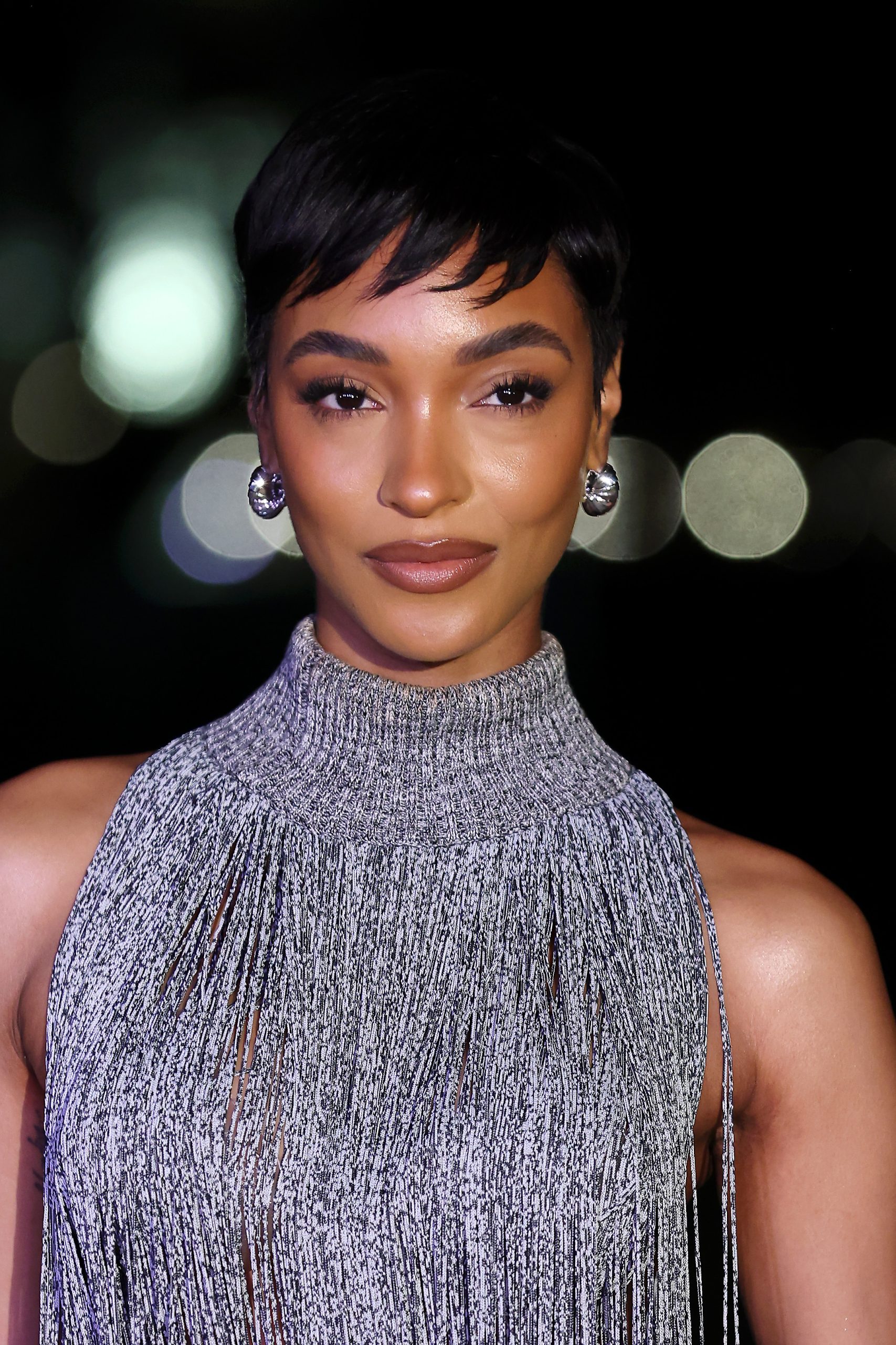 Short Swept To The Side Sculpted Black Pixie With Side Swept Bangs Short Swept To The Side Sculpted Black Pixie With Side Swept Bangs — Winter Pixie Haircuts