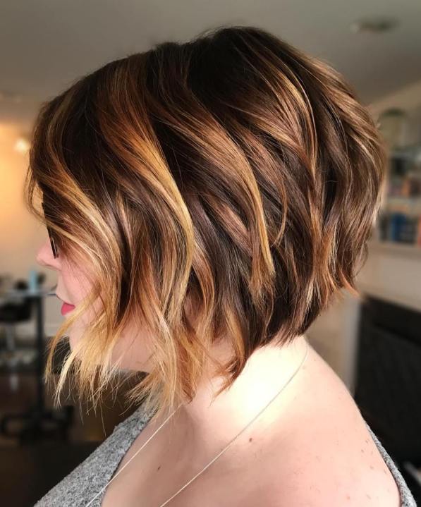 Thick Wavy Bob With Blonde Highlights — Winter Hair Colors for Short Hair