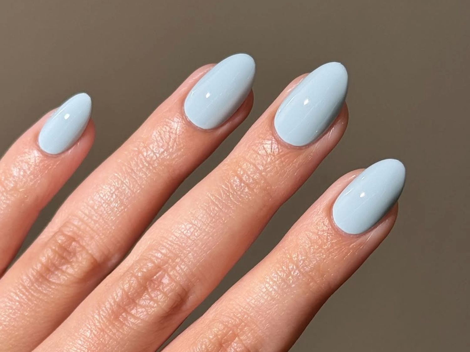 Medium Oval Pale Sky-Blue Glossy Nails Medium Oval Pale Sky-Blue Glossy Nails — Winter Nail Colors for Women Over 60
