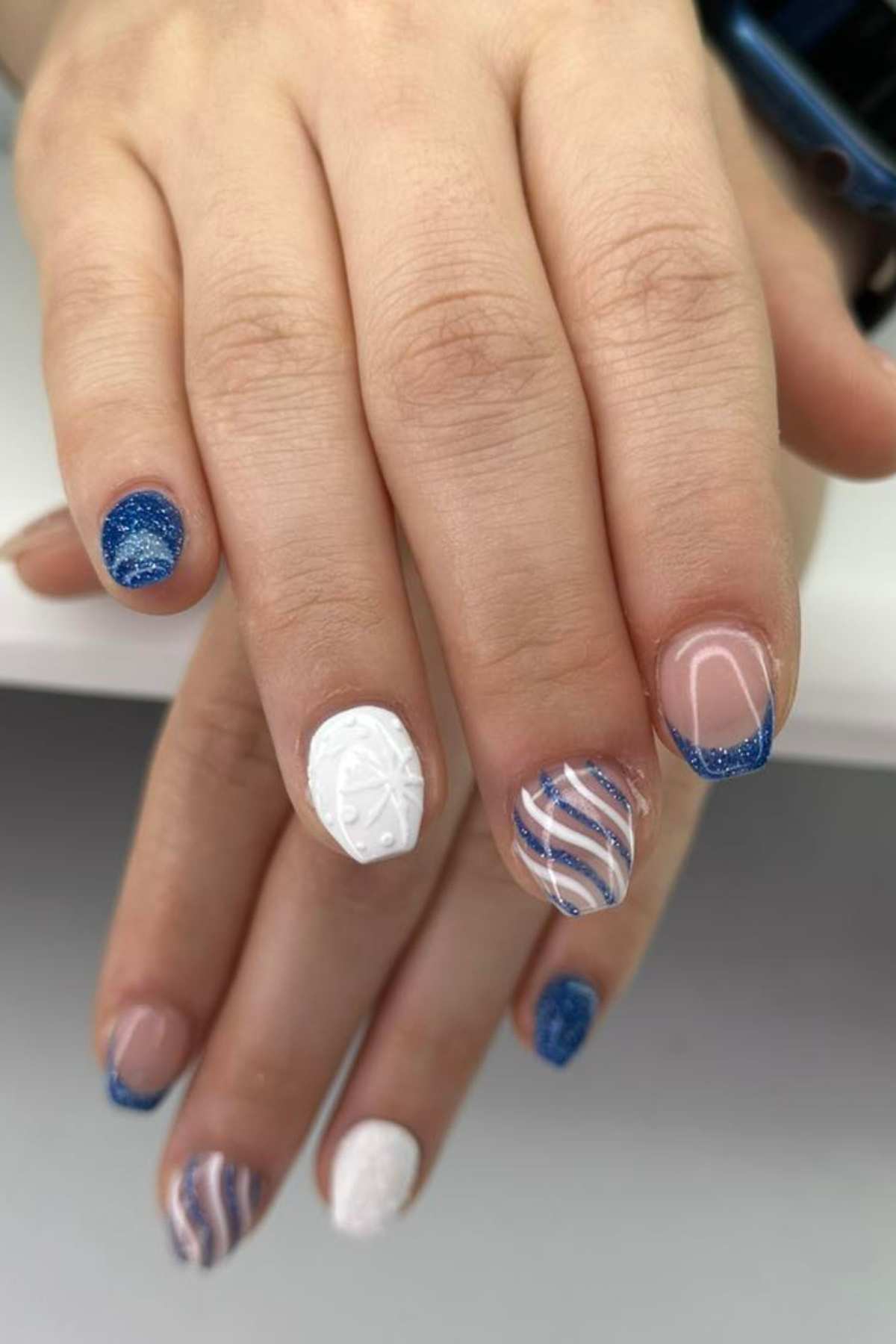 Blue Glitter French, Snowflakes, and Stripes Blue Glitter French, Snowflakes, and Stripes — Short Winter Gel Nails
