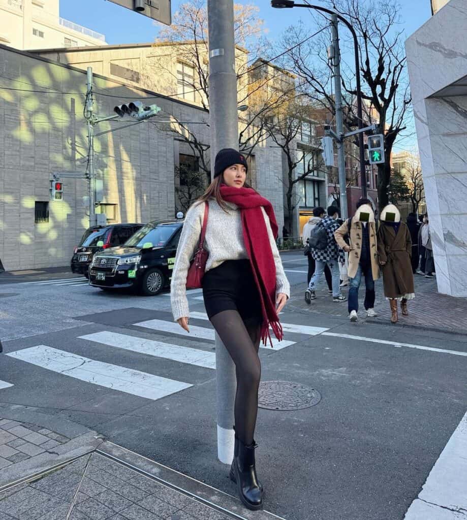 Grey Knit Sweater with Red Scarf and Black Boots for Casual Outings — Japan Winter Outfits