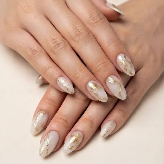 Medium Almond Gold Foil Wavy Lines Nails Medium Almond Gold Foil Wavy Lines Nails — Winter Nail Colors for Women Over 60