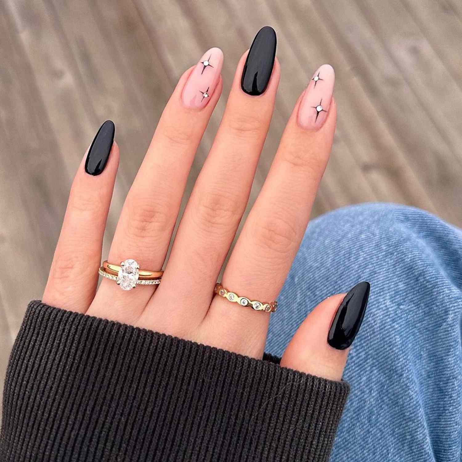 Glossy Black and Pink Star Accent Nails Glossy Black and Pink Star Accent Nails — Winter Black Nails