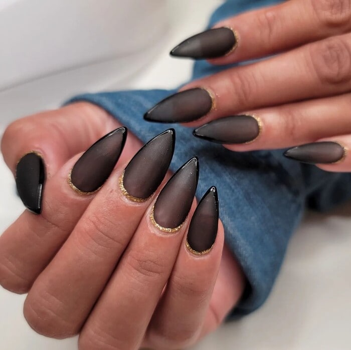 Sheer Matte Black Stiletto With Gold Trim Sheer Matte Black Stiletto With Gold Trim — Winter Stiletto Nails