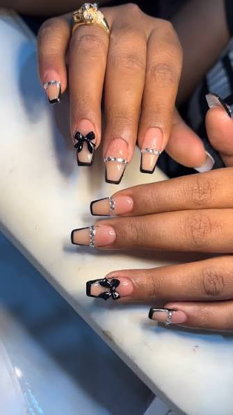 Long Stiletto Black French with Abstract Details Long Stiletto Black French with Abstract Details — black nail ideas