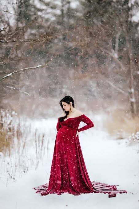 Dramatic Red Velvet Gown for a Maternity Winter Photoshoot Dramatic Red Velvet Gown for a Maternity Winter Photoshoot — Winter Photoshoot Outfits