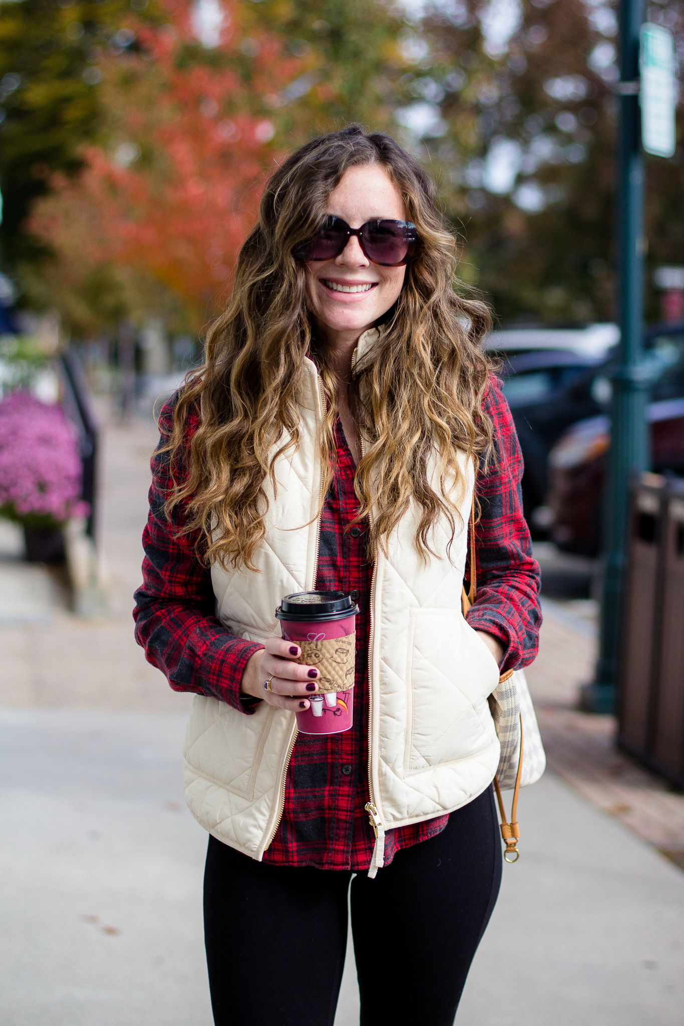Cream Puffer Vest with Plaid Flannel and Black Leggings — Puffer Vest Outfits