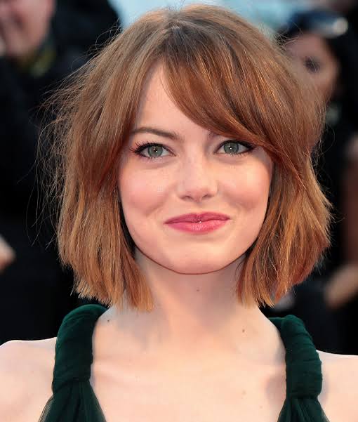 Shaggy Lob With Side-Swept Bangs Shaggy Lob With Side-Swept Bangs — Winter Haircuts for Round Faces