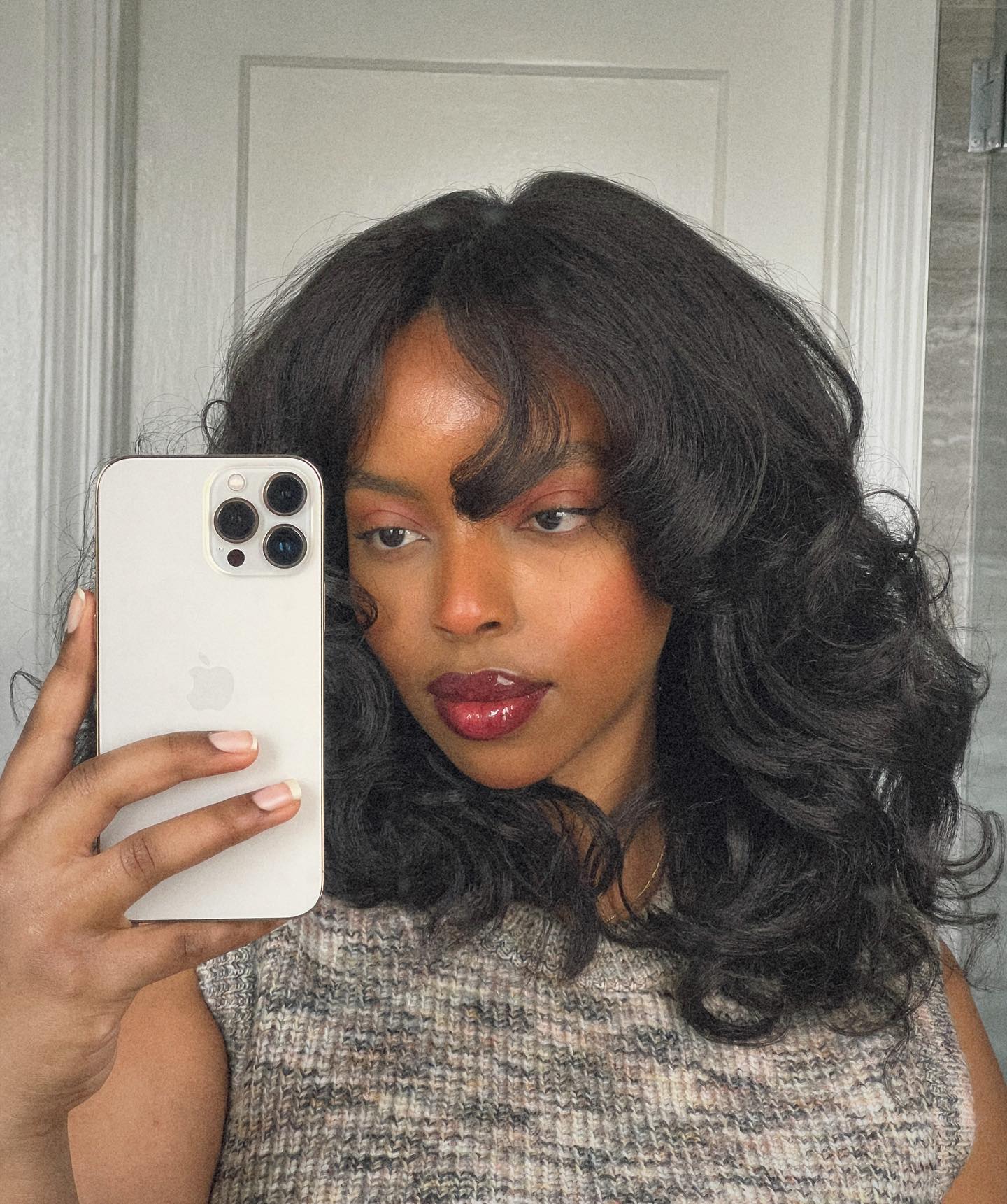 Shoulder-Length Layers With Curtain Bangs Shoulder-Length Layers With Curtain Bangs — Winter Haircuts for Black Women