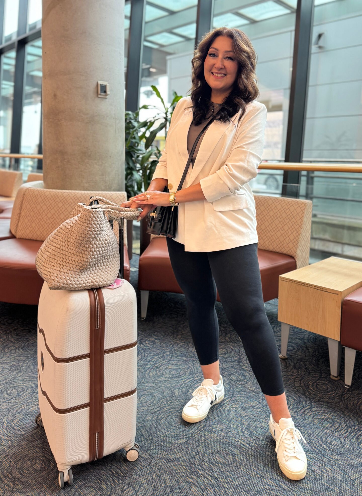 White Blazer Layered Over Casual Basics — Winter Travel Outfits