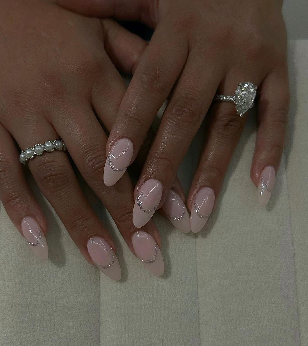 Sheer Pink Cuticle Silver Line Almonds Sheer Pink Cuticle Silver Line Almonds — Short Winter Almond Nails