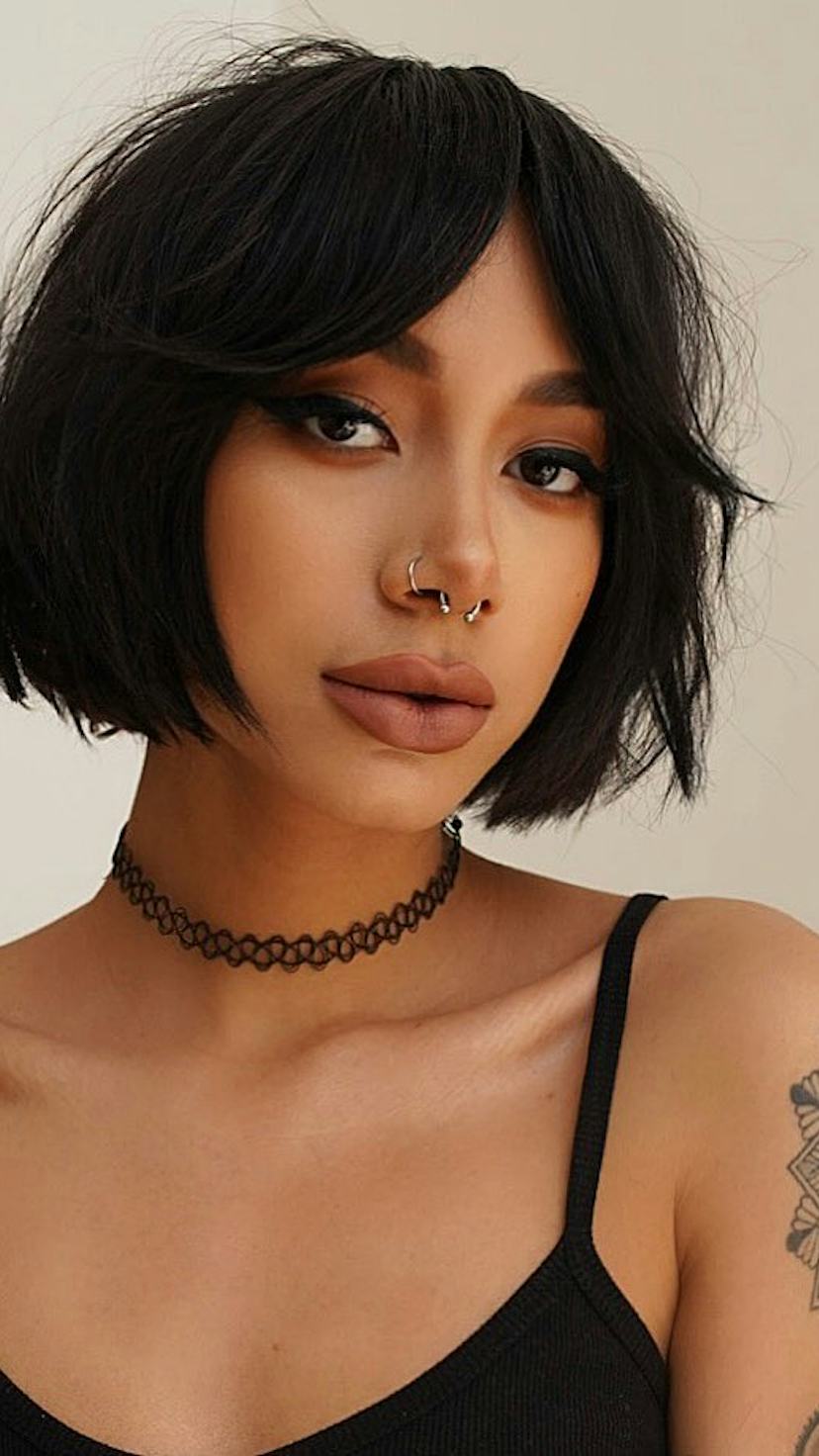 Sleek Black Bob With Blunt Bangs — Winter Haircuts with Bangs