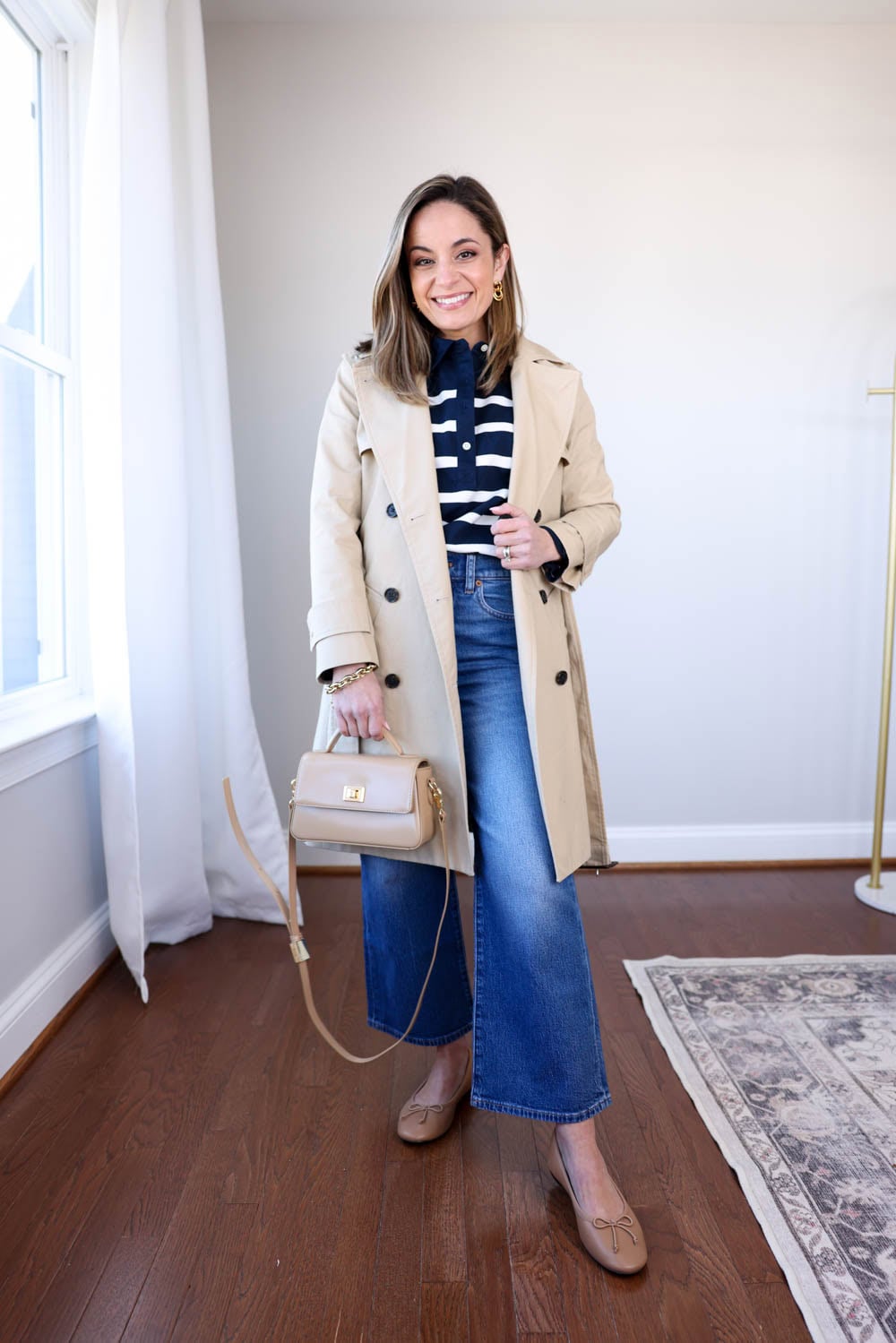 Classic Trench Coat with Striped Top and Wide-Leg Jeans — Winter to Spring Transition Outfits