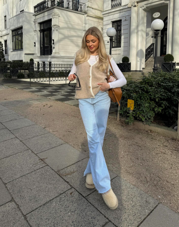 Casual Beige Fleece Vest Layered Over White Top — Late Winter Outfits
