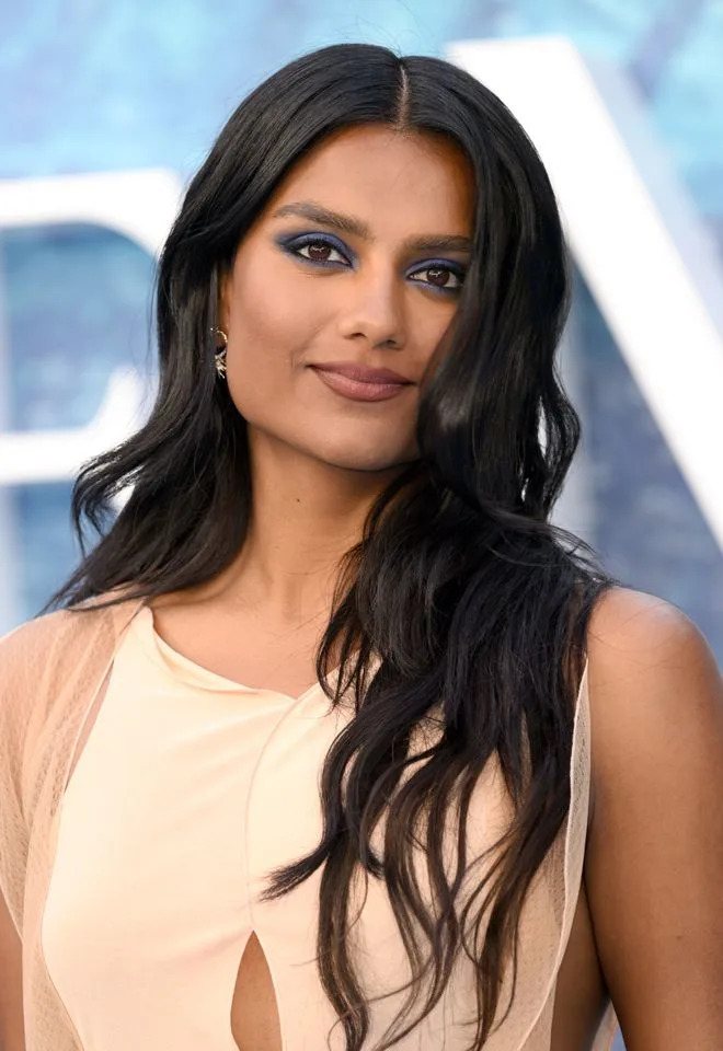 Voluminous Dark Brown Long Layers Voluminous Dark Brown Long Layers — Winter Haircuts for Oval Faces