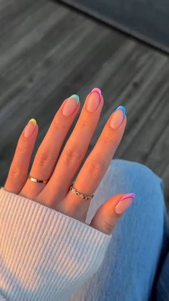 Vibrant Neon French Tips on Almonds Vibrant Neon French Tips on Almonds — almond nail inspo