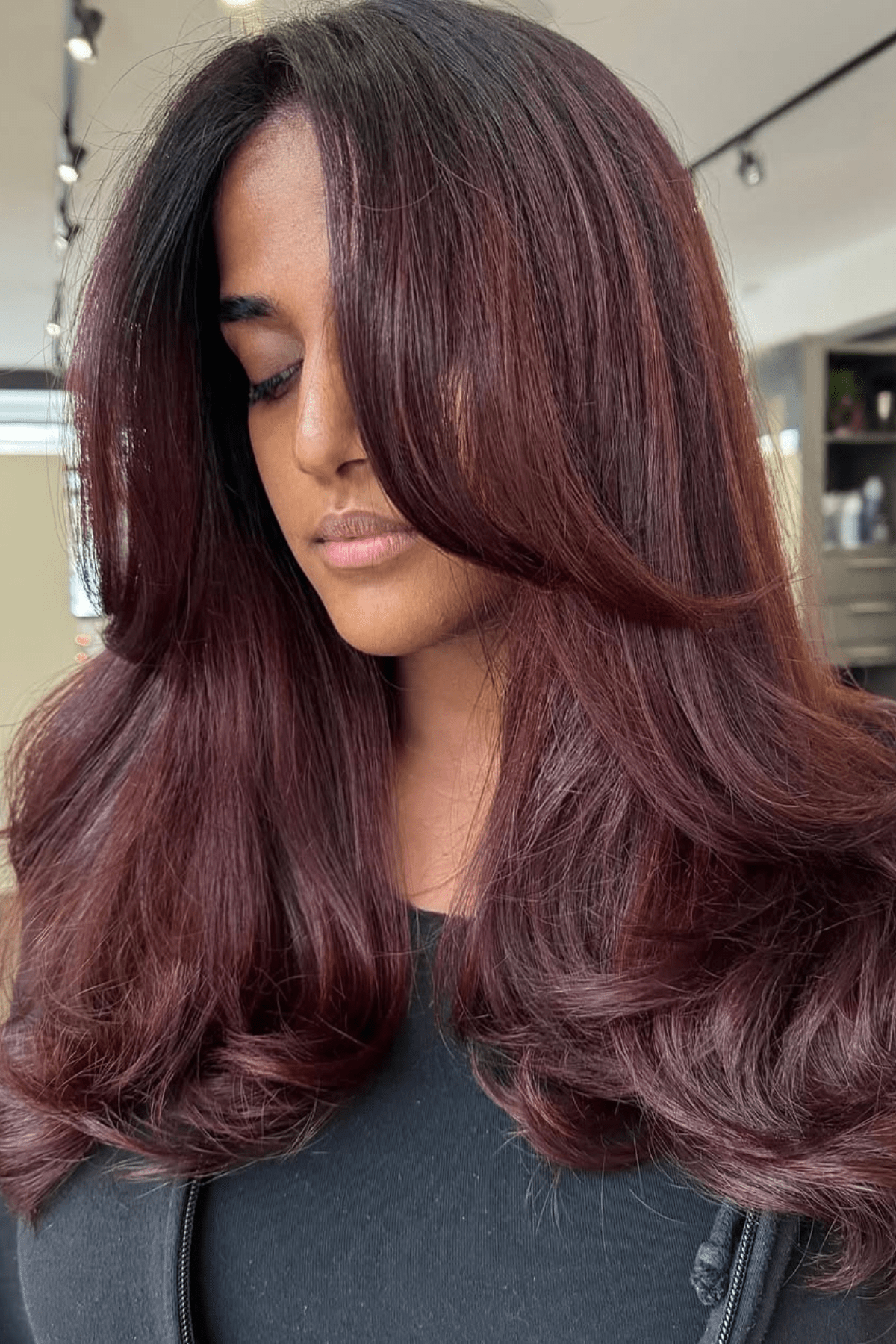Deep Burgundy Red With Curtain Bangs — Winter Hair Colors for Olive Skin