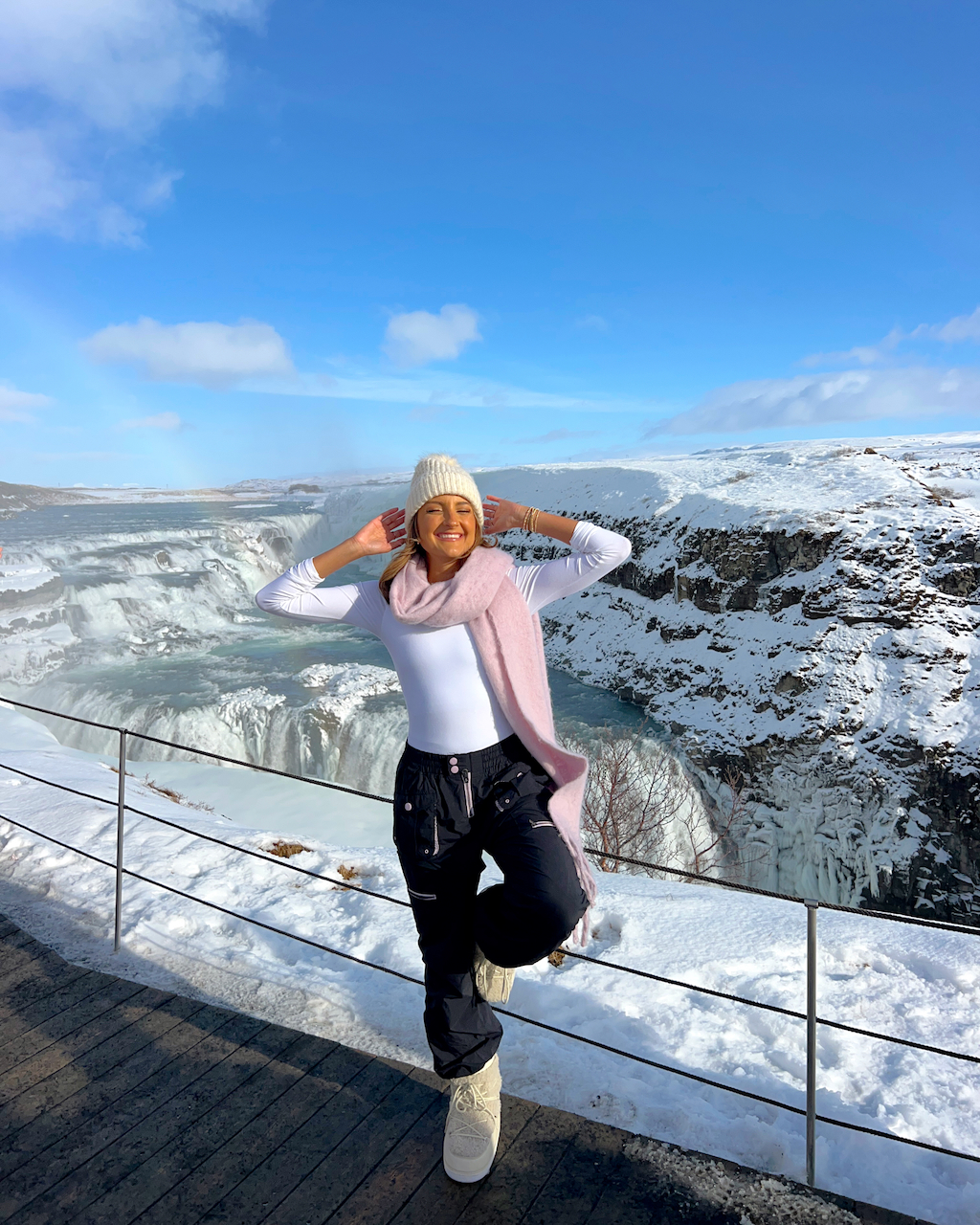 Black Ski Pants and White Top for Snowy Sightseeing — Iceland Winter Outfits