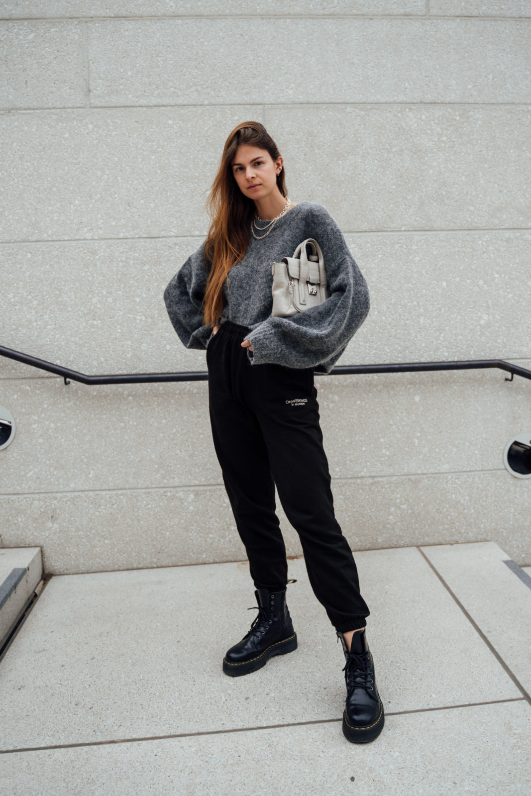 Edgy Streetwear with Black Sweatpants and Combat Boots — Sweatpants Outfits