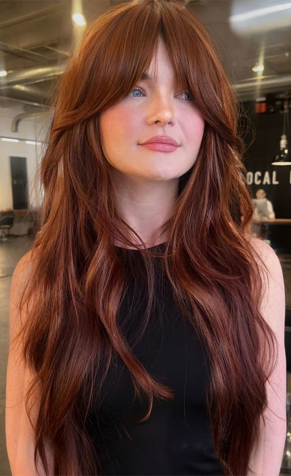 Mid-Back Auburn Waves With Curtain Bangs — Winter Haircuts with Bangs