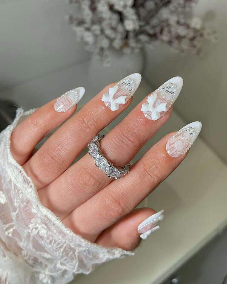 3D Bows on White Stiletto Nails 3D Bows on White Stiletto Nails — nail art ideas