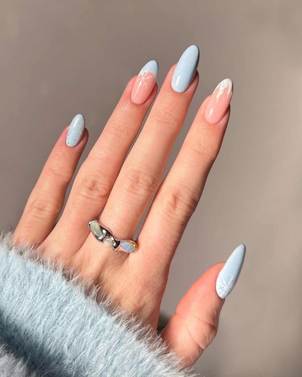 Pale Blue and Pink Split with Snowflake Art Pale Blue and Pink Split with Snowflake Art — Winter Nail Colors for Pale Skin