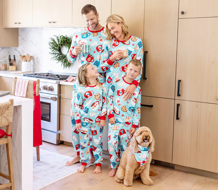 Matching Light Blue Pajamas with Festive Holiday Print Matching Light Blue Pajamas with Festive Holiday Print — Winter Family Photo Outfits