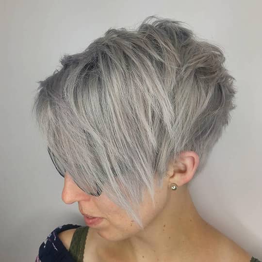 Voluminous Grey Pixie With Fringe — Winter Haircuts for Women Over 50