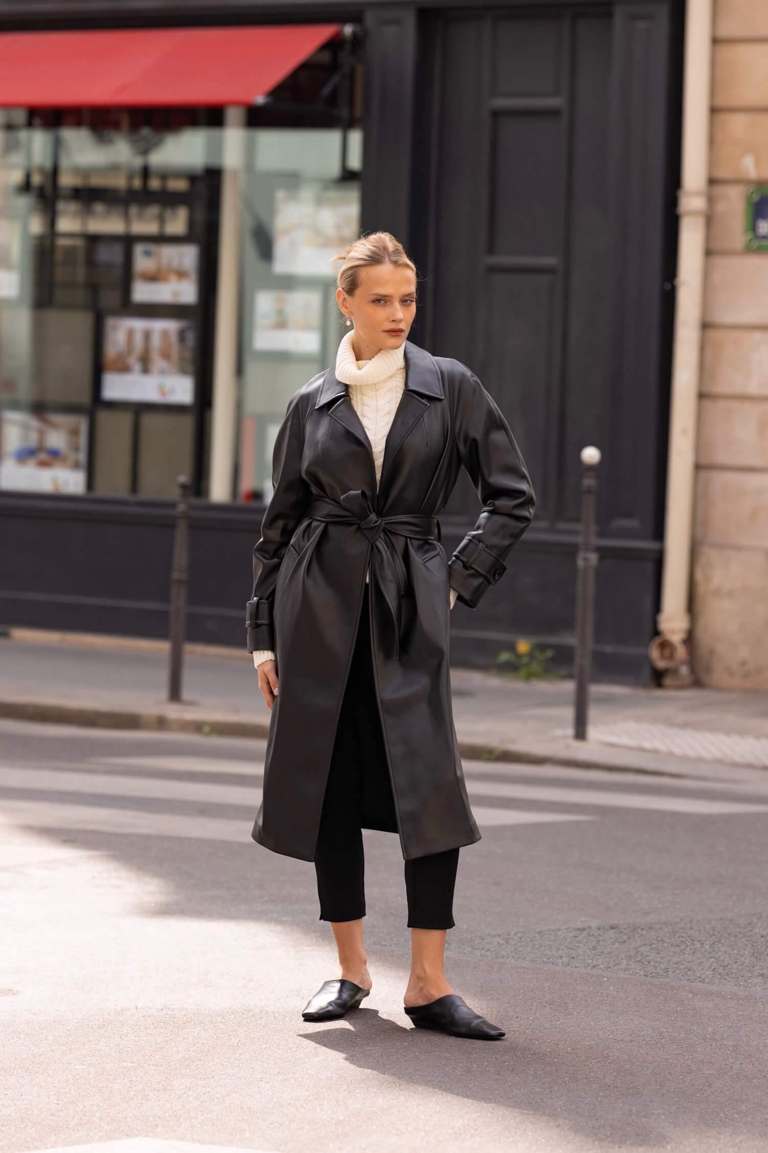 Everyday Chic: Belted Black Leather Trench Coat with Cream Turtleneck Everyday Chic: Belted Black Leather Trench Coat with Cream Turtleneck — Long Coat Outfits