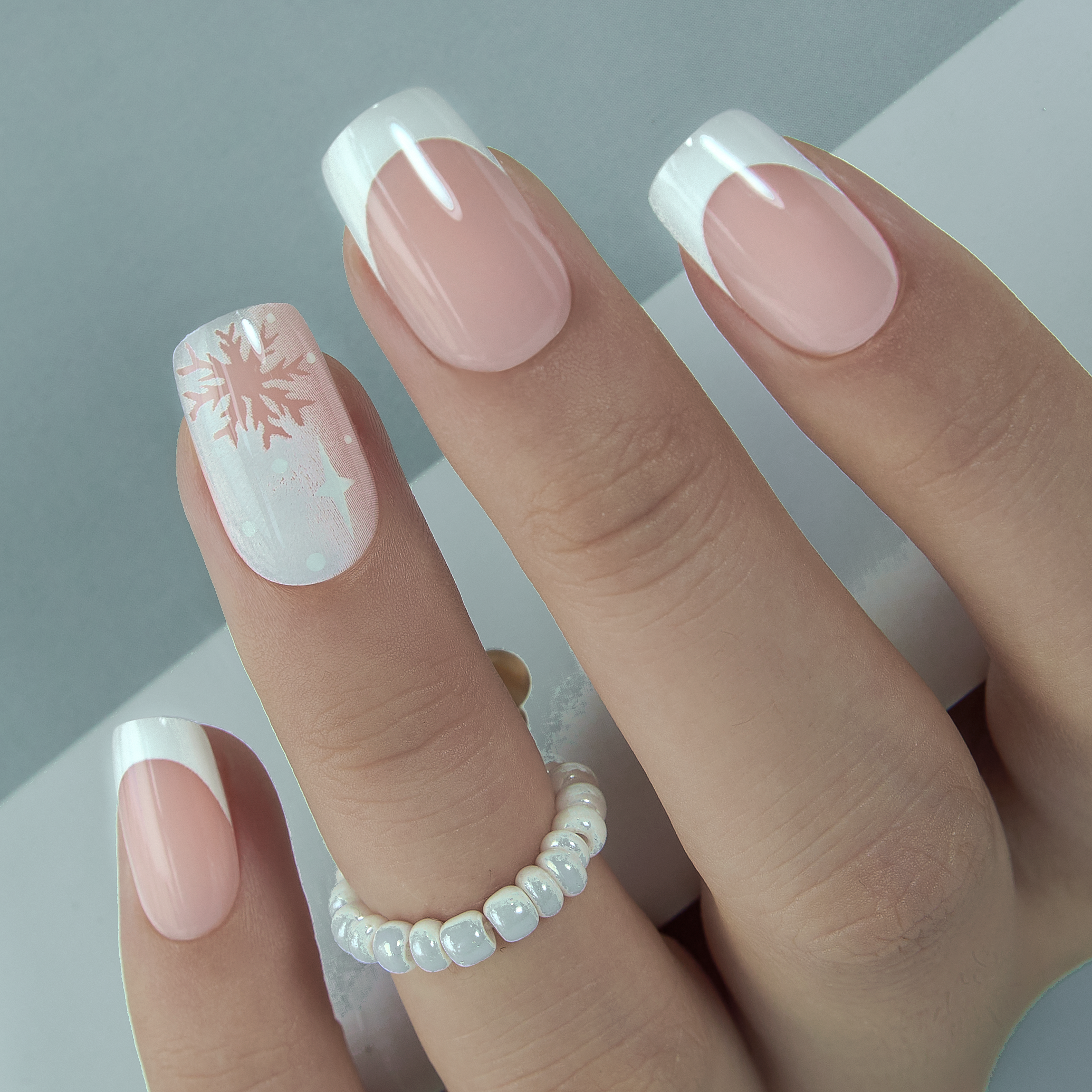 Sheer Pink French with Snowflake Accent Sheer Pink French with Snowflake Accent — Winter Squoval Nails
