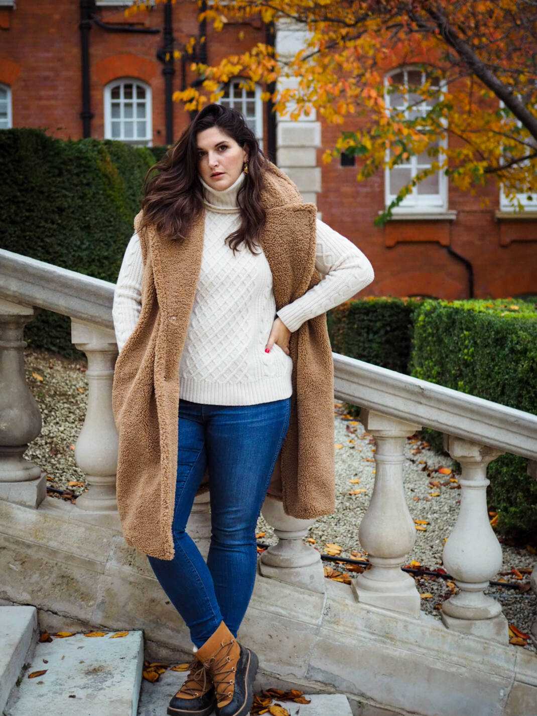 Cozy Gilet Layered Over Knitwear and Denim Cozy Gilet Layered Over Knitwear and Denim — London Winter Outfits