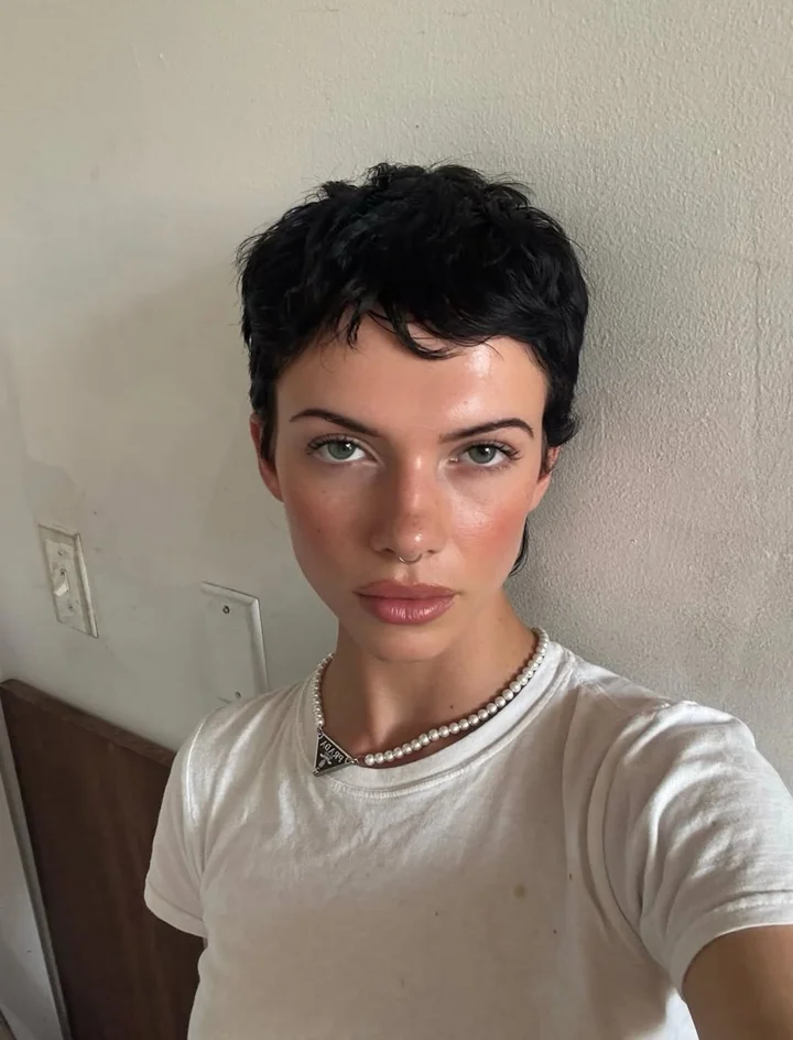 Messy Black Pixie with Wispy Bangs Messy Black Pixie with Wispy Bangs — very short women haircuts