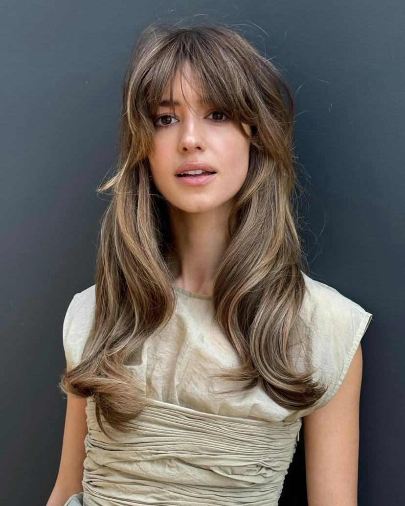 Collarbone Shag With Curtain Bangs Collarbone Shag With Curtain Bangs — Winter Haircuts for Wavy Hair