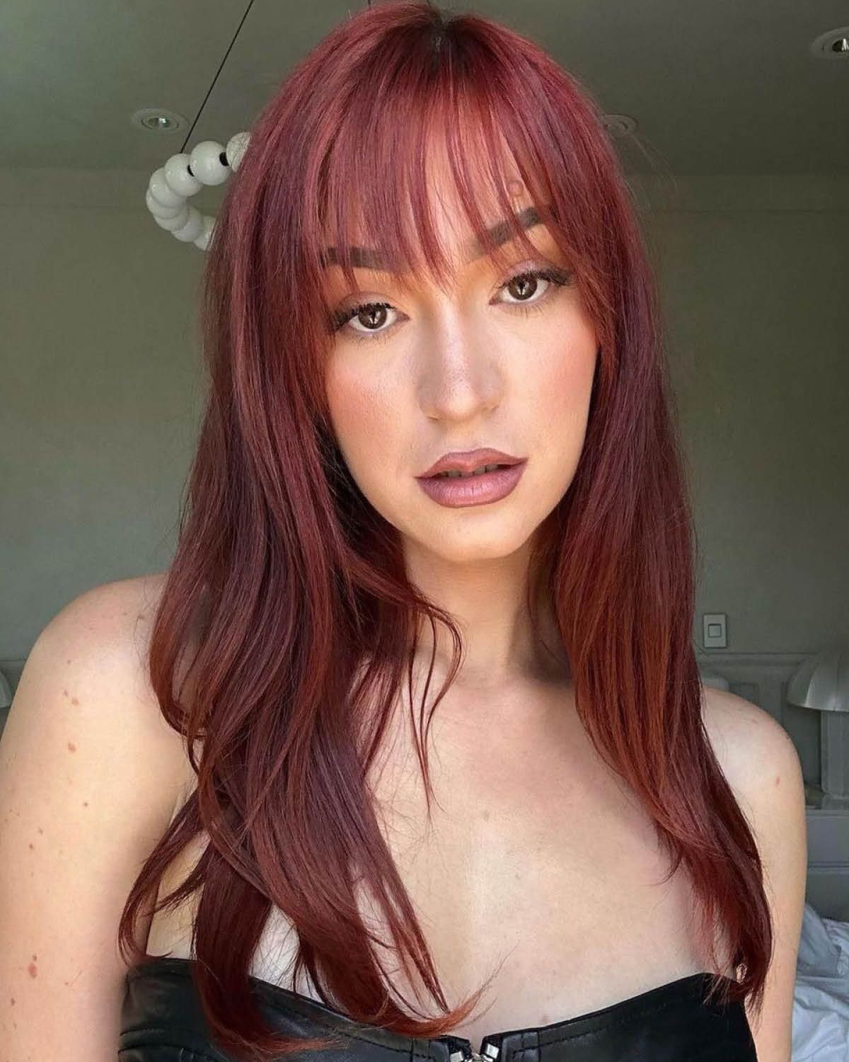 Deep Red Auburn With Blunt Bangs — Winter Auburn Hair Color