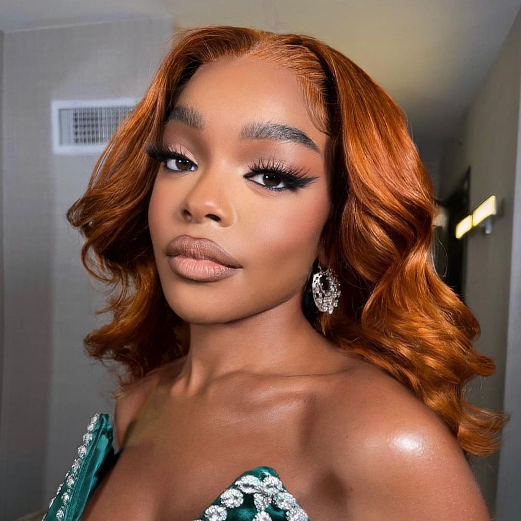 Bright Copper Orange Wavy Lob — Winter Hair Colors for Black Women