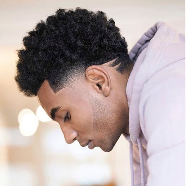 Coily Black Hair With Taper Fade Design Coily Black Hair With Taper Fade Design — Winter Haircuts for Men