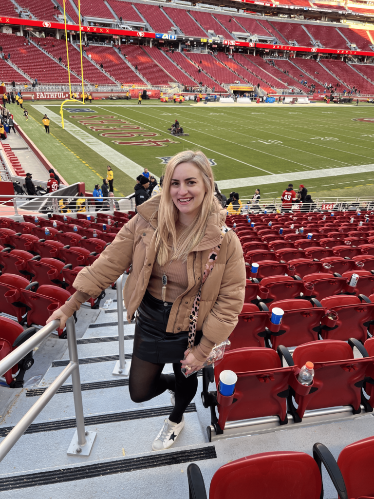 Puffer Jacket Meets Mini Skirt for a Playful Look Puffer Jacket Meets Mini Skirt for a Playful Look — Winter Football Game Outfits