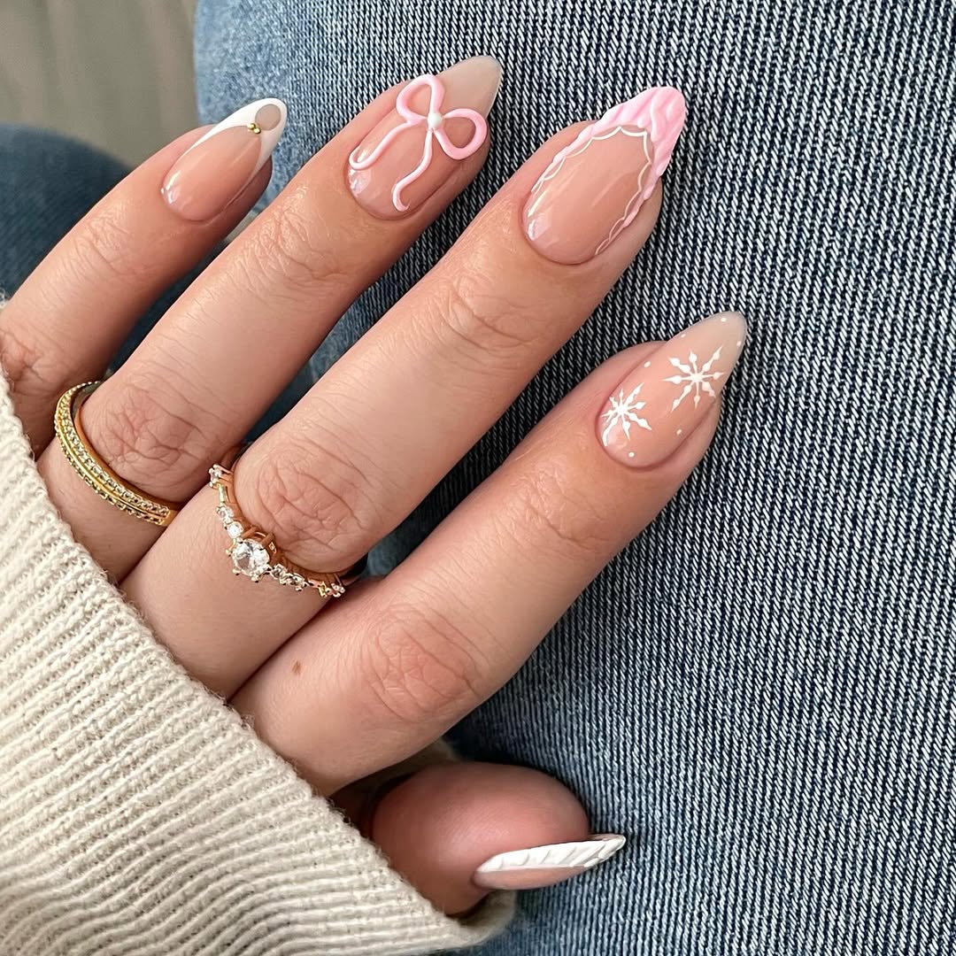 Nude Stiletto With Snowflakes And Pink Bow Nude Stiletto With Snowflakes And Pink Bow — Winter Stiletto Nails