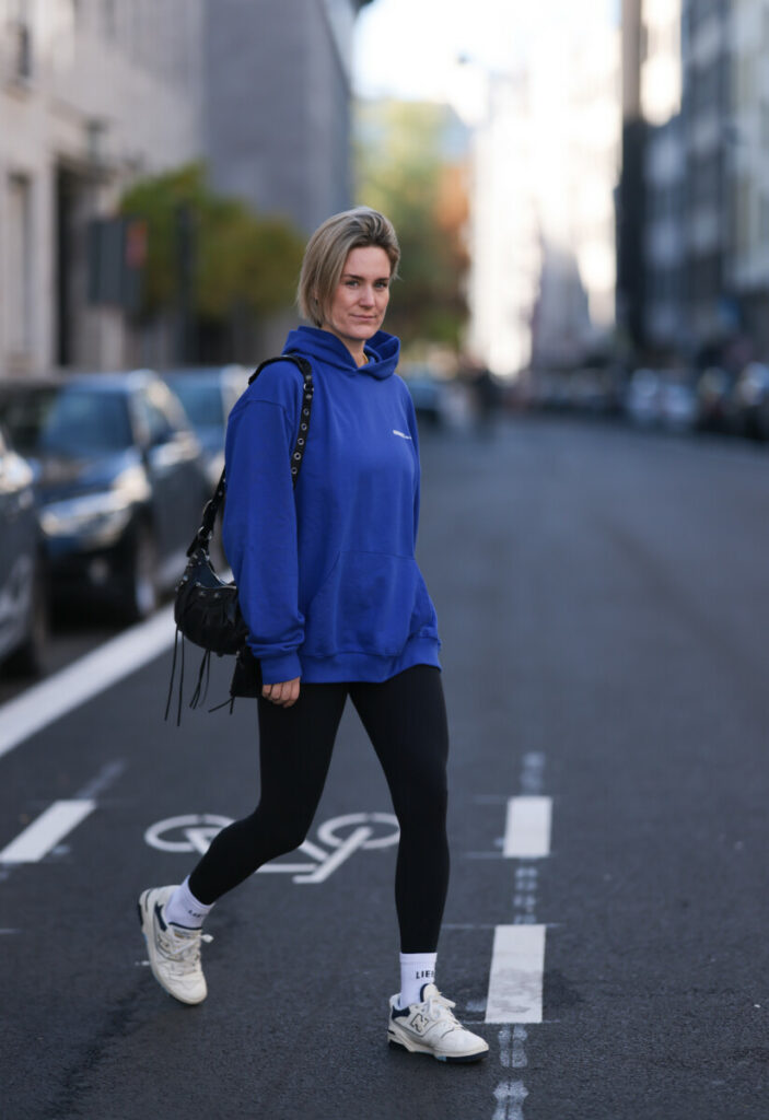 Oversized Blue Hoodie, Black Leggings, and White and Grey Sneakers Oversized Blue Hoodie, Black Leggings, and White and Grey Sneakers — Winter Outfits with Sneakers