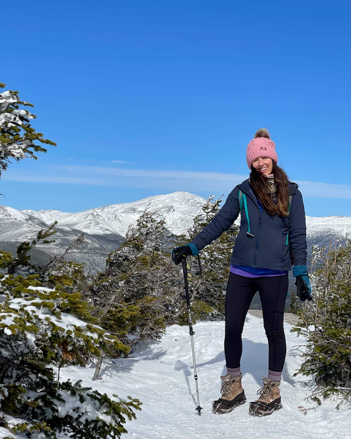 Winter Hiking Outfit with Navy Jacket and Pink Beanie — Late Winter Outfits