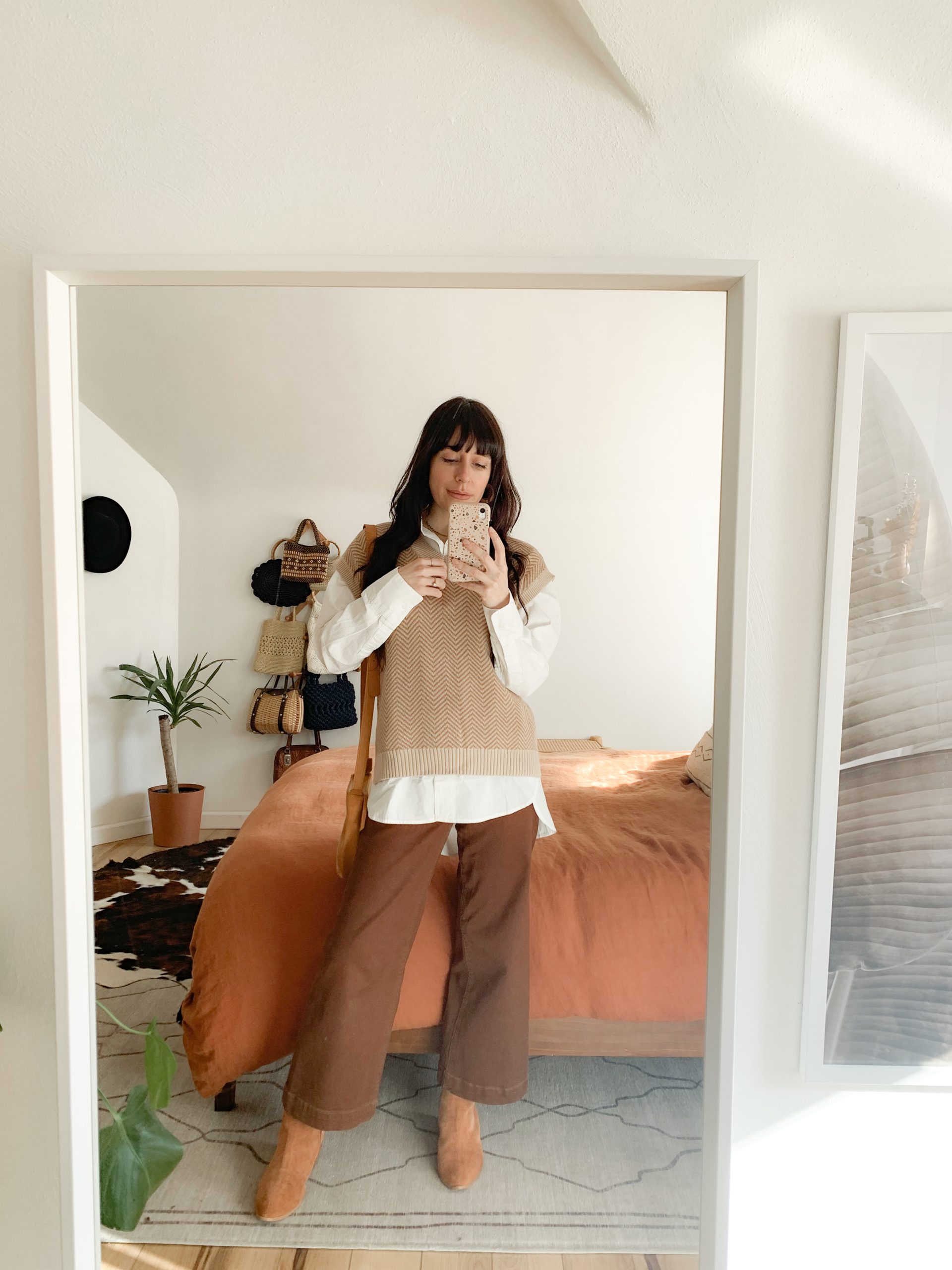 White Button-Down with Sweater Vest and Brown Wide-Leg Pants White Button-Down with Sweater Vest and Brown Wide-Leg Pants — Neutral Winter Outfits