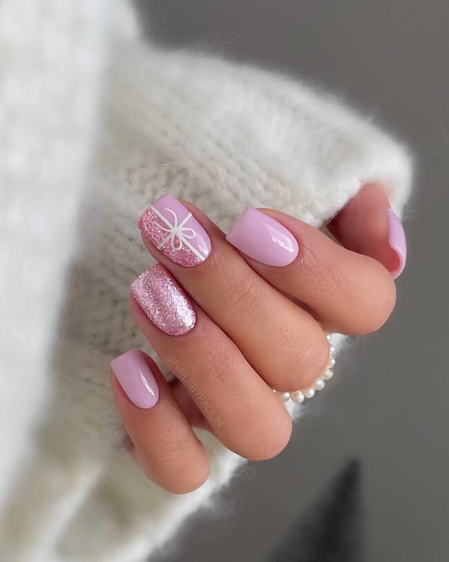 Light Pink with Rose Gold Glitter & Bow Light Pink with Rose Gold Glitter & Bow — Short Winter Acrylic Nails