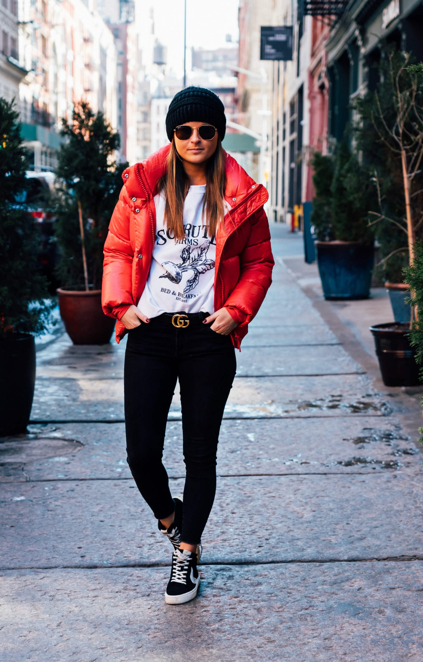 Vibrant Red Puffer Jacket with Graphic Tee and Skinny Jeans — Long Puffer Coat Outfits