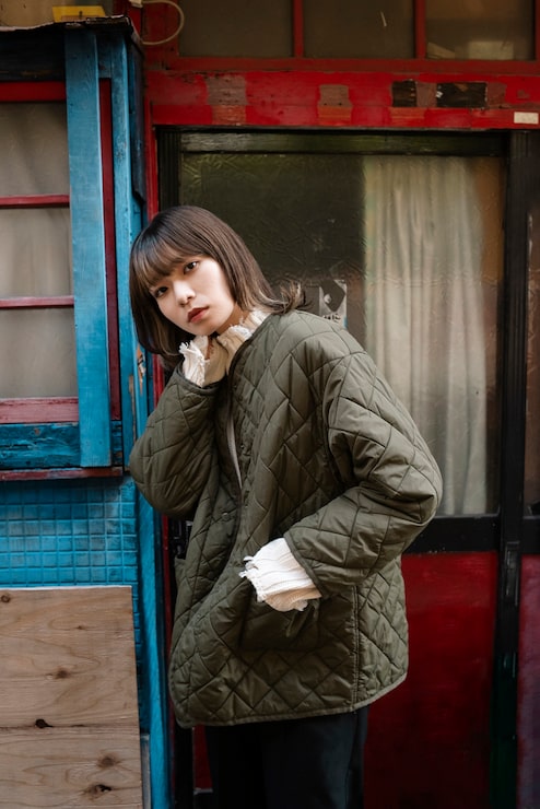 Relaxed Quilted Jacket Over a Ruffled Blouse for Casual Comfort — Japan Winter Outfits